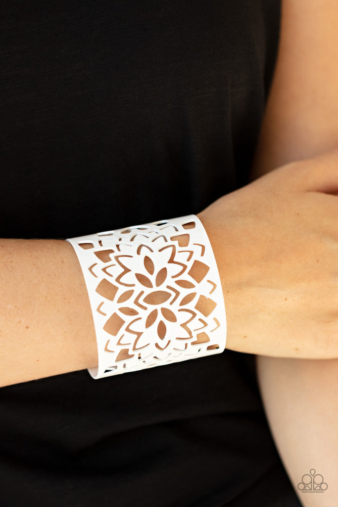 Featuring an airy floral stenciled design, a shiny white cuff wraps around the wrist for a vivacious finish.  Sold as one individual bracelet.