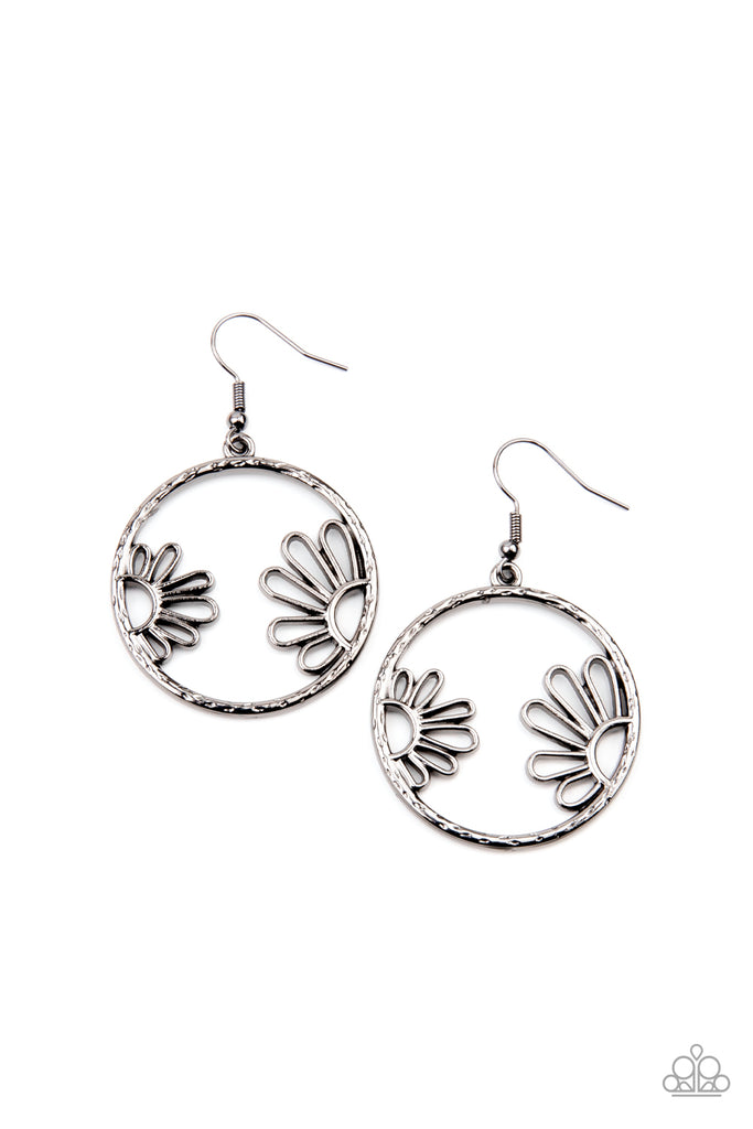 A pair of airy daisies bloom inside a hammered gunmetal hoop, creating a whimsically seasonal display. Earring attaches to a standard fishhook fitting.  Sold as one pair of earrings.