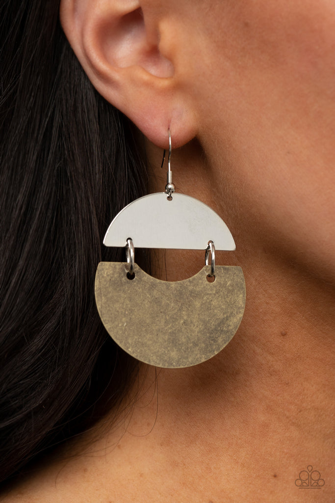 An antiqued brass frame links to a shiny silver crescent, creating a rustic lure. Earring attaches to a standard fishhook fitting.  Sold as one pair of earrings.  