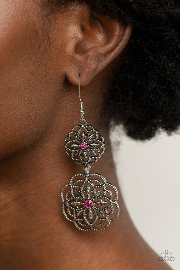 Dotted with dainty pink rhinestone centers, studded mandala-like silver frames connect into a whimsical floral lure. Earring attaches to a standard fishhook fitting.  Sold as one pair of earrings.