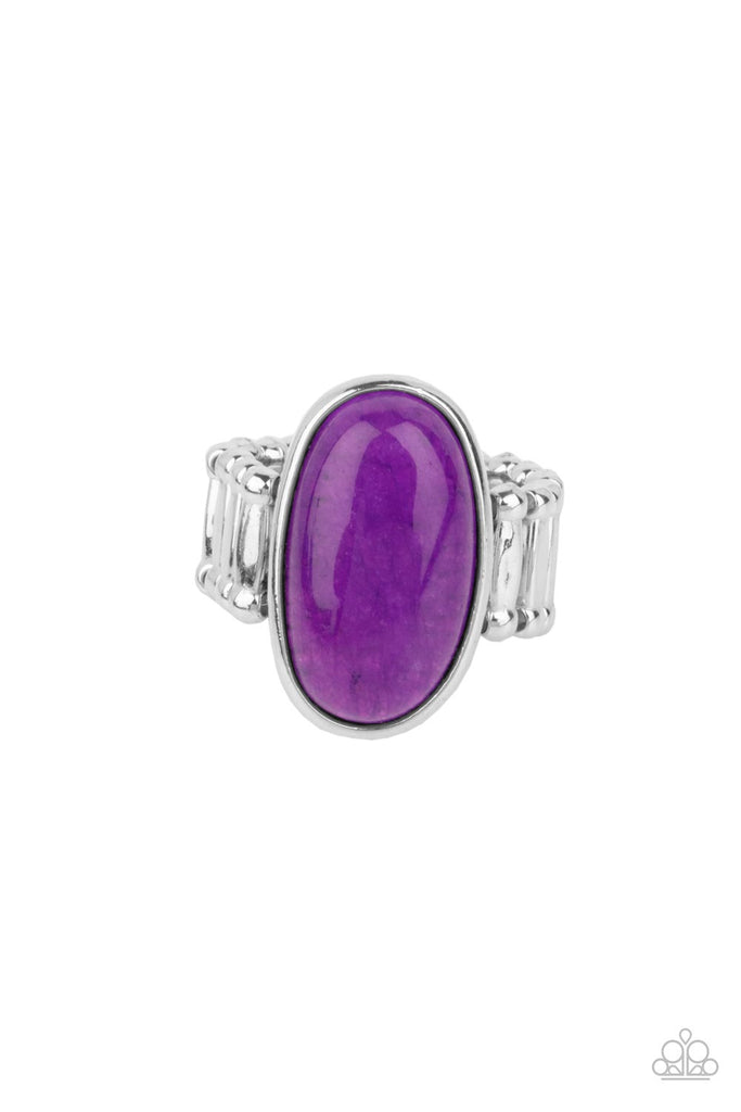 mystical-mantra-purple An oval purple stone is encased inside a sleek silver frame, creating a mystical centerpiece atop the finger. Features a stretchy band for a flexible fit.  Sold as one individual ring.
