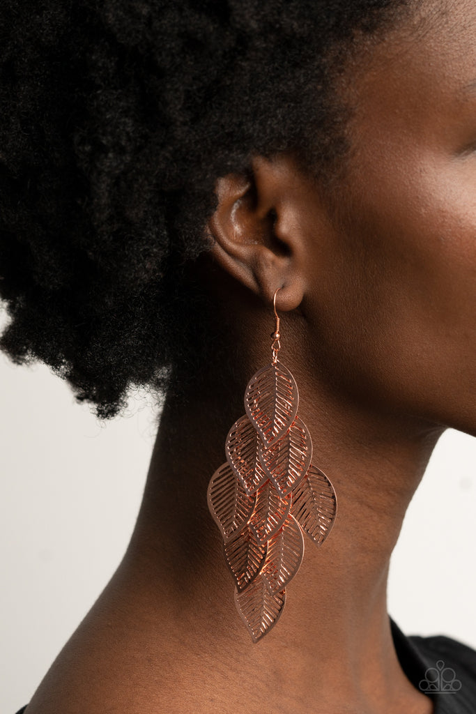 Stenciled shiny copper leaf frames cascade from a shiny copper netted fitting, creating a shimmery leafy fringe. Earring attaches to a standard fishhook fitting.  Sold as one pair of earrings.