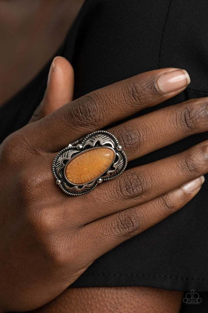 An oversized glassy orange stone teardrop is pressed into the center of a decoratively scalloped silver frame, creating an enchanting centerpiece atop the finger. Features a stretchy band for a flexible fit.  Sold as one individual ring.  New Kit