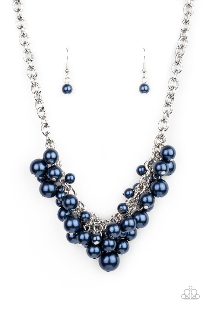 A bubbly collection of classic and oversized blue pearls swing from the bottom of a bold silver chain, creating a dramatic fringe below the collar. Features an adjustable clasp closure.  Sold as one individual necklace. Includes one pair of matching earrings.
