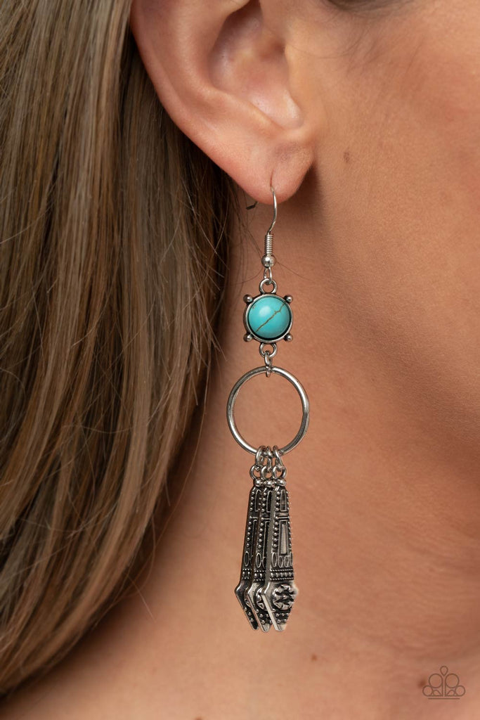 Embellished with dainty flowers, flared silver bars glide along the bottom of a dainty silver ring that attaches to a turquoise stone fitting, creating a whimsical lure. Earring attaches to a standard fishhook fitting.  Sold as one pair of earrings.