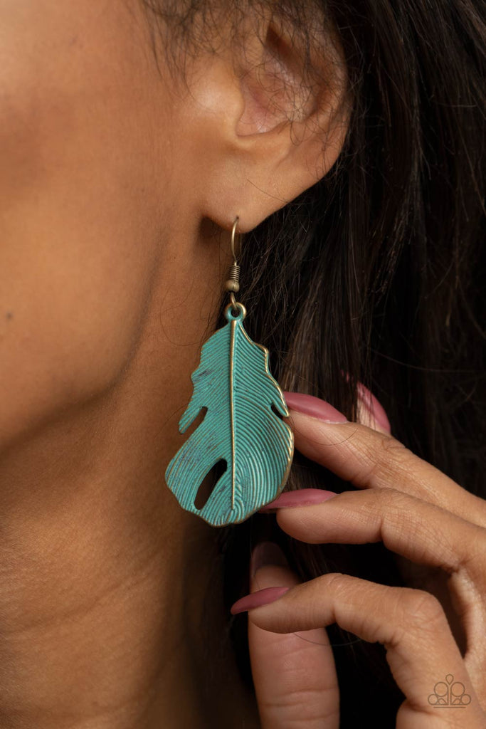 Brushed in a patina finish, a lifelike brass feather swings from the ear for a free-spirited fashion. Earring attaches to a standard fishhook fitting.  Sold as one pair of earrings.