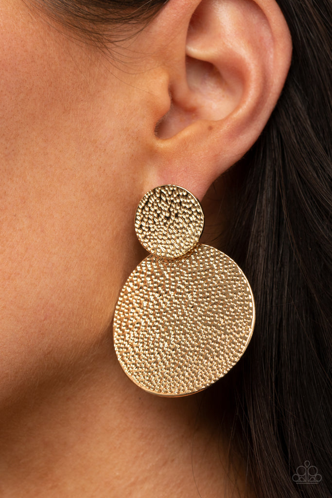 Delicately hammered in shimmery textures, curved gold discs delicately link into a stacked lure. Earring attaches to a standard post fitting.  Sold as one pair of post earrings.