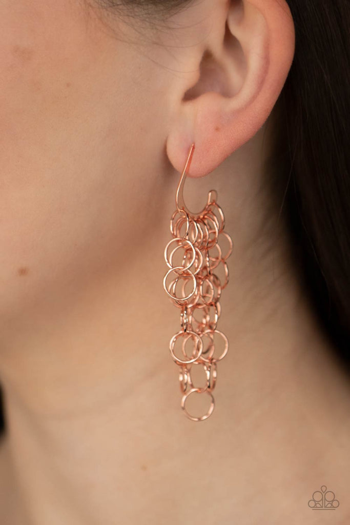 Strands of shiny copper links cascade from the bottom of a dainty hook shaped hoop, creating a rebellious fringe. Hoop measures approximately 1/2" in diameter. Earring attaches to a standard post fitting.  Sold as one pair of hoop earrings.  New Kit