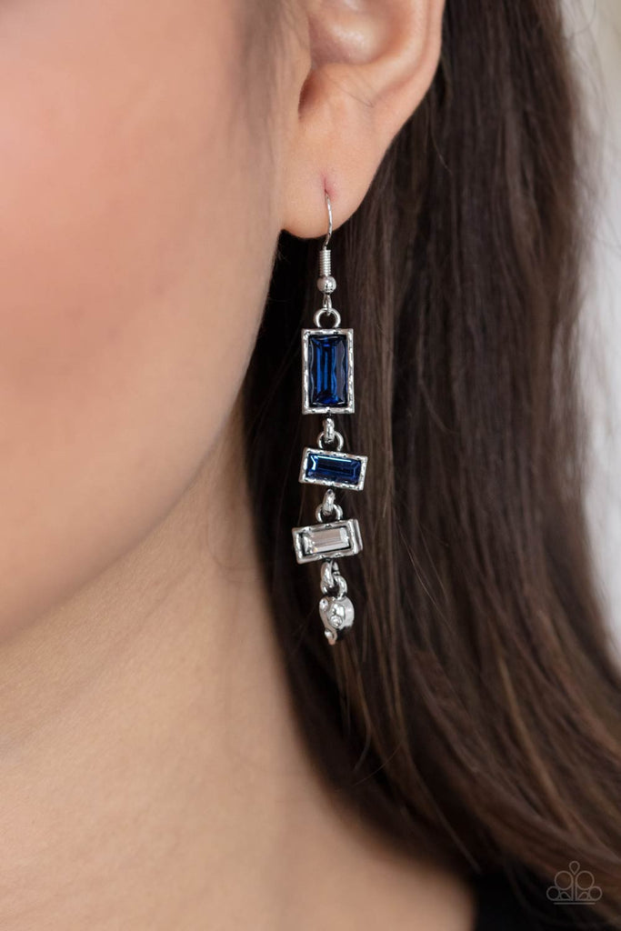 Featuring hammered silver frames, emerald cut dark blue, blue, and white rhinestones stack into an edgy lure. Dotted in glassy white rhinestones, a dainty silver teardrop attaches to the bottom for an abstract finish. Earring attaches to a standard fishhook fitting.  Sold as one pair of earrings.  New Kit