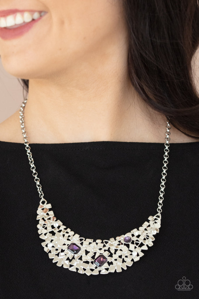 fabulously-fragmented-purple Sporadically dotted in mismatched purple and white rhinestones, a smattering of fragmented silver frames coalesce into a bold half moon below the collar for an edgy fashion. Features an adjustable clasp closure.  Sold as one individual necklace. Includes one pair of matching earrings.