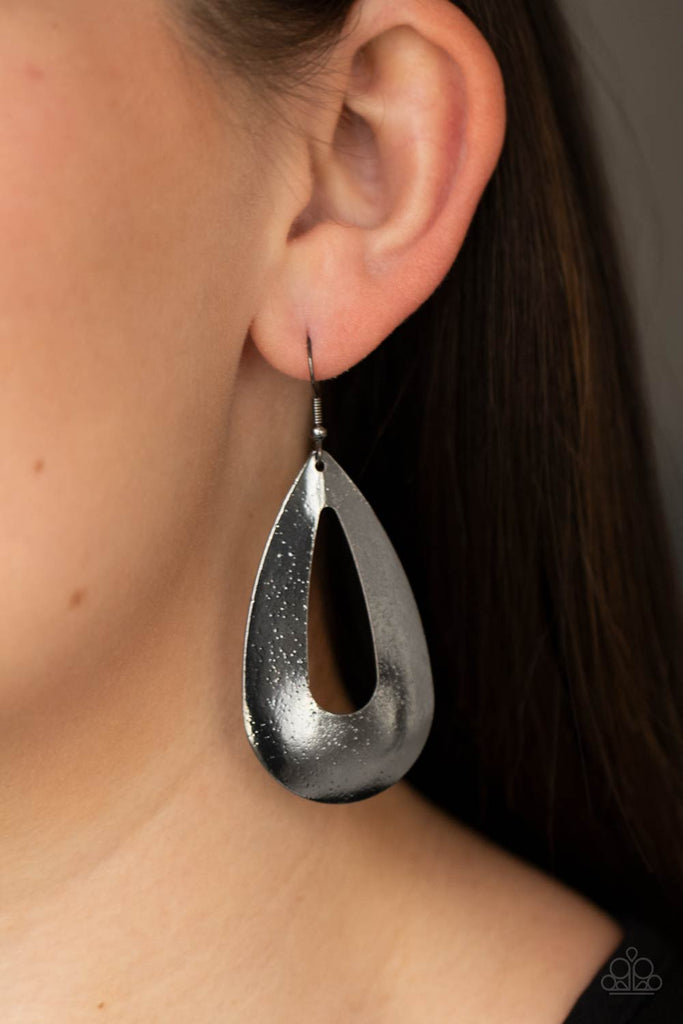 Delicately hammered in endless gunmetal shimmer, a flat glistening oval silhouette swings from the ear for a beautiful basic look. Earring attaches to a standard fishhook fitting.  Sold as one pair of earrings.