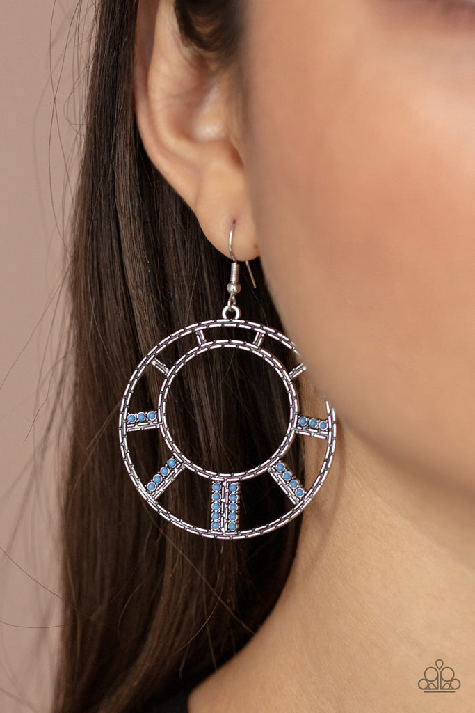 Stacks of dainty French Blue beads flare out from a textured silver frame, creating a colorful sunburst pattern. Earring attaches to a standard fishhook fitting.  Sold as one pair of earrings.