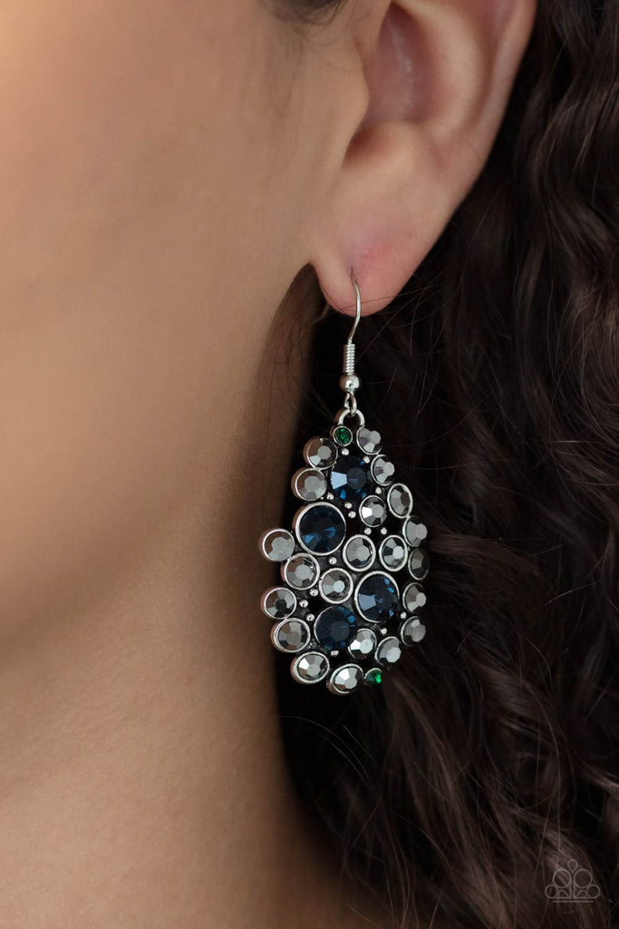 Varying in size, a smoldering collection of hematite, green, and blue rhinestones coalesce into an airy teardrop for a sassy look. Earring attaches to a standard fishhook fitting.  Sold as one pair of earrings.