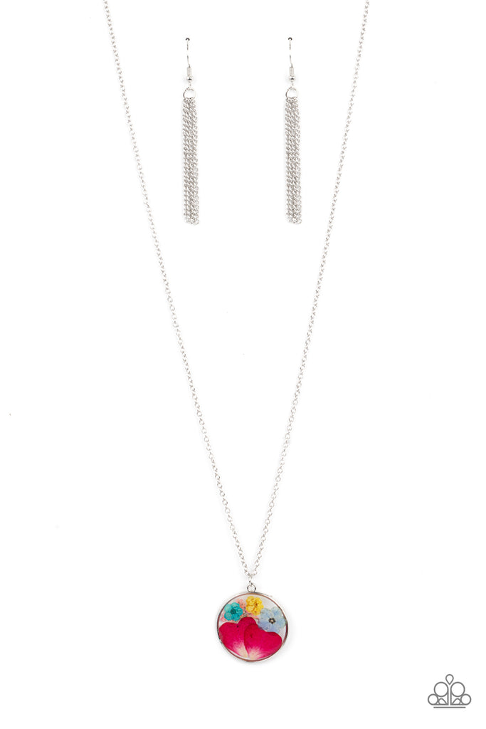 A colorful collection of wildflowers is encased in a glassy pendant, creating a whimsical display below the collar. Features an adjustable clasp closure.  Sold as one individual necklace. Includes one pair of matching earrings.