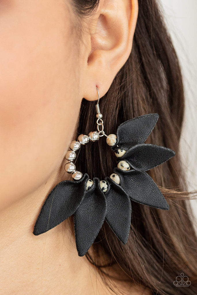 Infused with a row of shiny silver beads, black leather petals are separated by black dotted white stones along a dainty silver hoop, creating a wild fringe. Earring attaches to a standard fishhook fitting.  Sold as one pair of earrings.