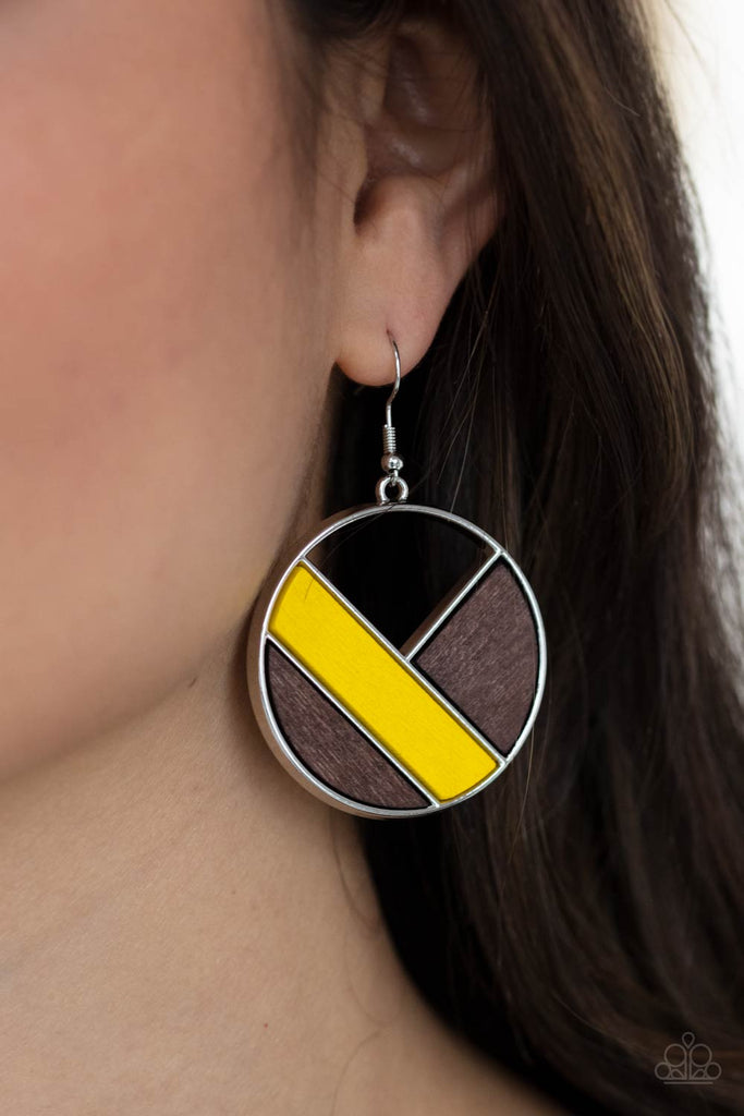 Featuring yellow and brown finishes, geometric wooden frames piece together inside an airy silver hoop for a modern look. Earring attaches to a standard fishhook fitting.  Sold as one pair of earrings.  