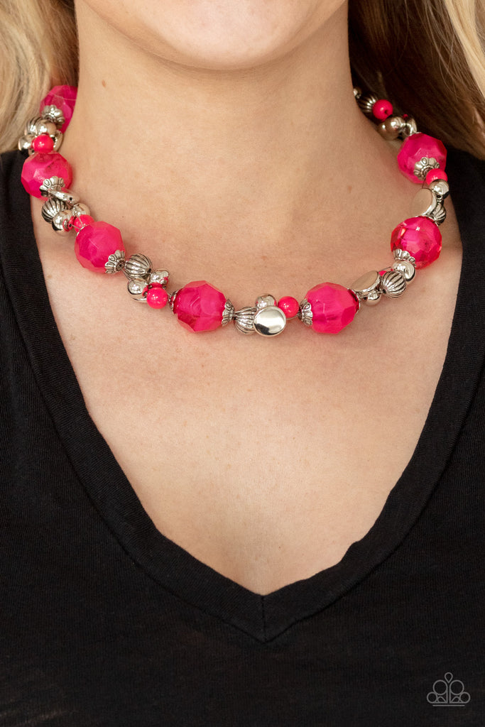 Faceted opaque pink crystal-like beads join clusters of mismatched silver and pink beads along a wire, creating a vivacious pop of color below the collar. Features an adjustable clasp closure.  Sold as one individual necklace. Includes one pair of matching earrings.  New Kit