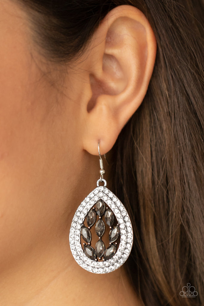 Smoky marquise cut rhinestones collect inside two borders of glassy white rhinestones, coalescing into a sparkly teardrop. Earring attaches to a standard fishhook fitting.  Sold as one pair of earrings.