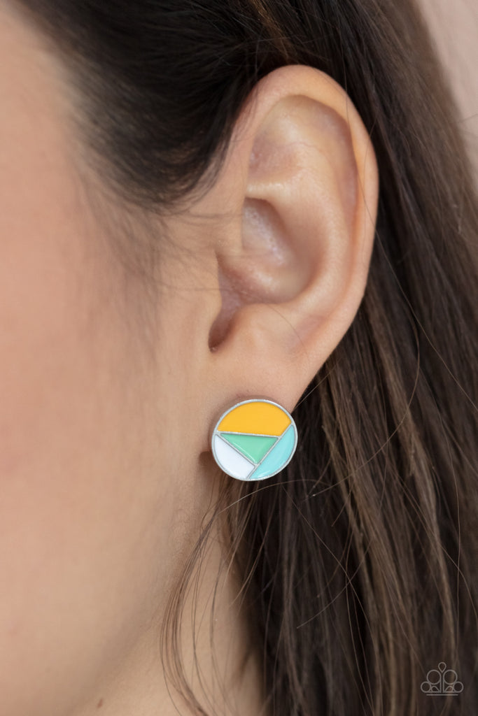 A dainty round frame is painted in Green Ash, Cerulean, Marigold, and white geometric sections, creating an abstract display. Earring attaches to a standard post fitting.  Sold as one pair of post earrings.