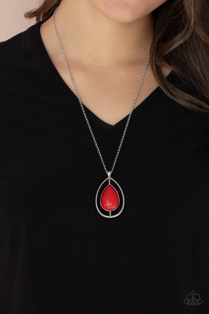 Attached to a textured silver-like rod, a fiery red stone teardrop is nestled inside an airy silver teardrop frame, creating an earthy pendant at the bottom of a shiny silver chain. Features an adjustable clasp closure.  Sold as one individual necklace. Includes one pair of matching earrings.