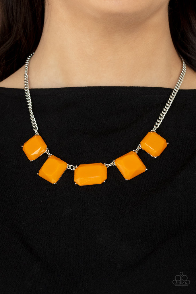 Varying in shape, faceted Marigold acrylic frames delicately link below the collar, creating a vivacious display. Features an adjustable clasp closure.  Sold as one individual necklace. Includes one pair of matching earrings.  
