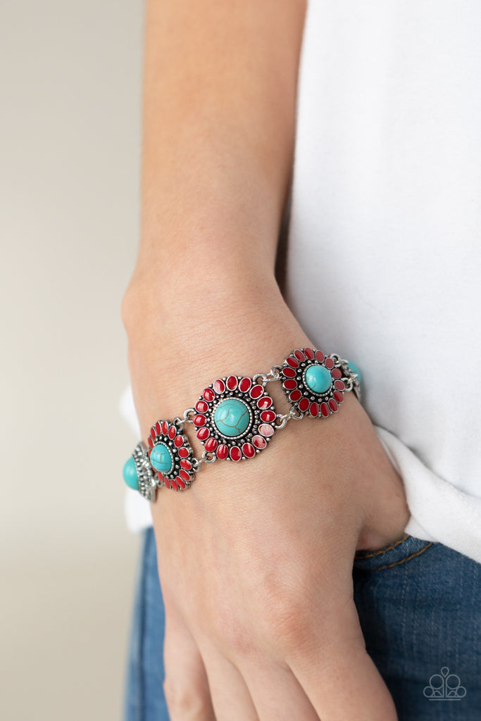 Featuring refreshing turquoise stone centers, studded silver frames double-link with red petaled floral frames around the wrist for a colorfully seasonal look. Features an adjustable clasp closure.  Sold as one individual bracelet.  