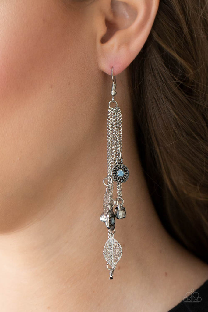 Dewy Cerulean rhinestone dotted frames, airy silver leaves, silver disco ball-like beads stream from the bottoms of dainty silver chains, creating a whimsically tasseled display. Earring attaches to a standard fishhook fitting.  Sold as one pair of earrings.