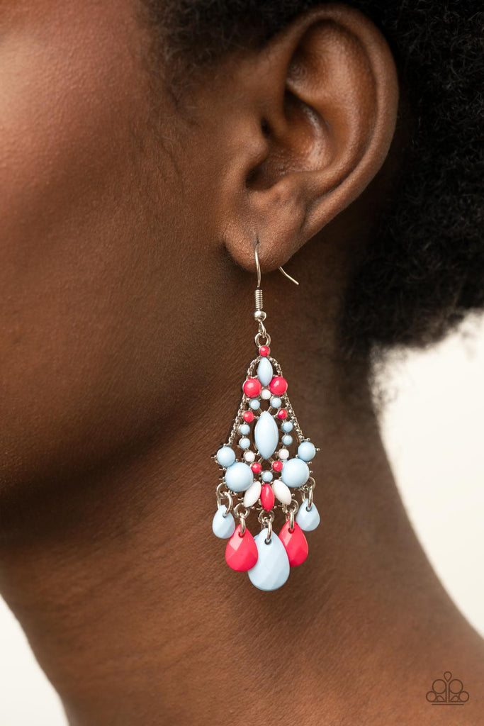 An array of bubbly Cerulean, white, and Raspberry Sorbet beads decoratively adorn the front of a studded silver frame. Faceted teardrops drip from the bottom of the colorful frame, creating a whimsical fringe. Earring attaches to a standard fishhook fitting.  Sold as one pair of earrings.