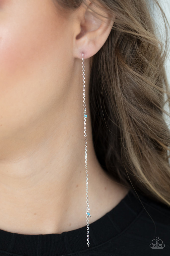 Pairs of dainty silver and Cerulean seed beads trickle along a lengthened silver chain, creating an extended chandelier. Earring attaches to a standard post fitting.  Sold as one pair of post earrings.  