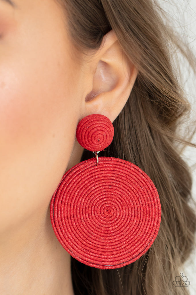 A generous disc of red thread spirals around and around for a dizzying finish as it connects to a red button post. Earring attaches to a standard post fitting.  Sold as one pair of post earrings.