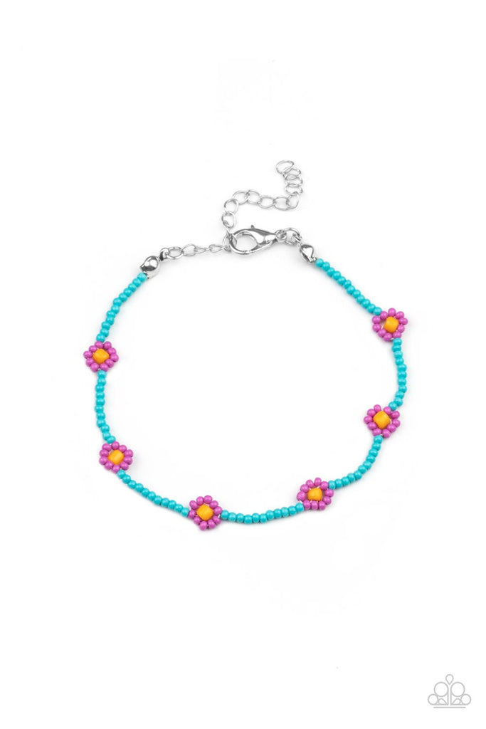 Bright Lavender flowers circle around a turquoise beaded bracelet for a crafty summer camp vibe. Features an adjustable clasp closure.  Sold as one individual bracelet.