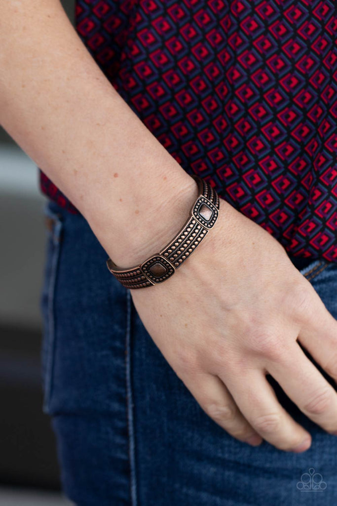 Featuring studded copper patterns, square and rectangular frames are threaded along stretchy bands around the wrist for a rustic flair.  Sold as one individual bracelet.