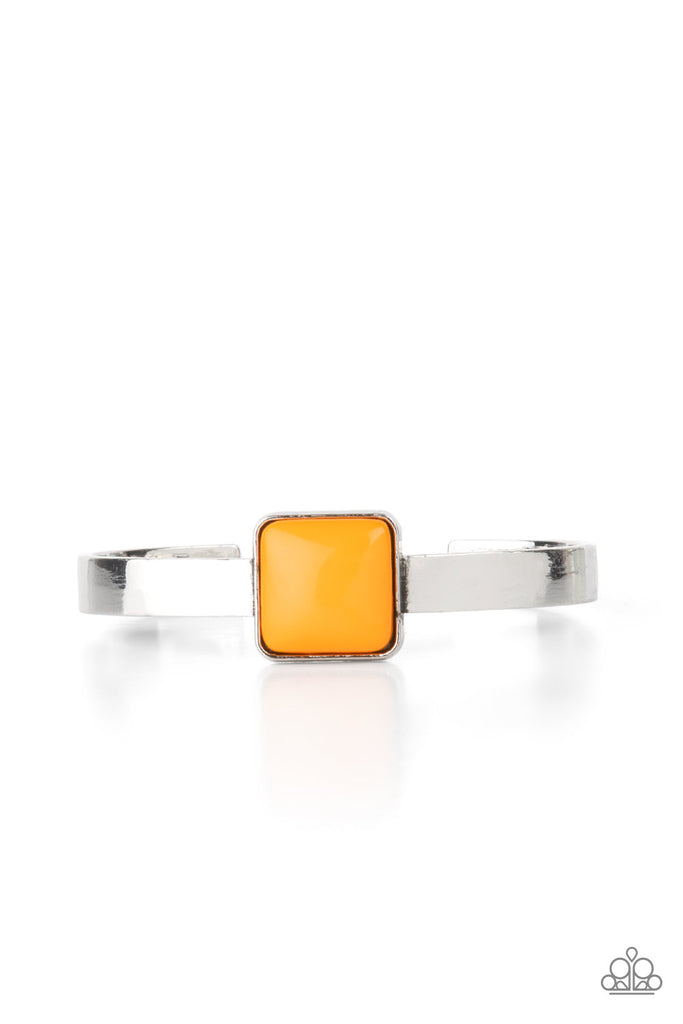 A square Marigold bead is pressed into the center of a sleek silver frame that sits atop a dainty silver cuff, creating a bold pop of color atop the wrist.  Sold as one individual bracelet.