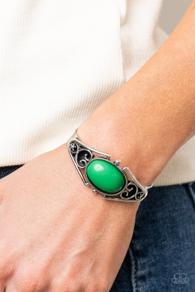 A bubbly Mint bead is nestled inside a silver filigree filled frame atop a dainty silver cuff, creating a whimsical centerpiece around the wrist.  Sold as one individual bracelet.