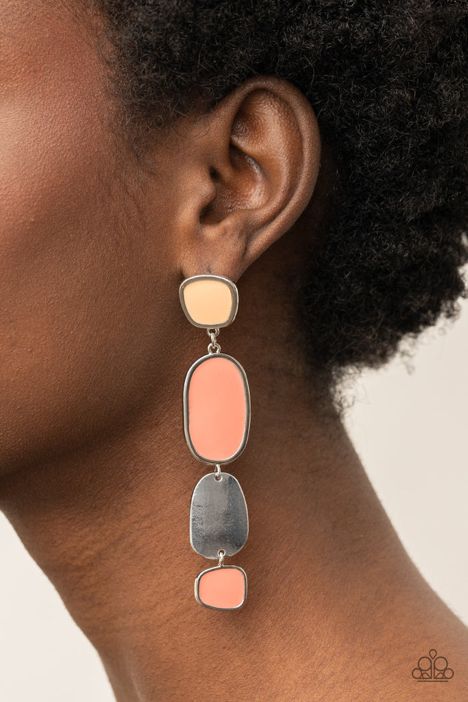 Painted in shiny Desert Mist and Burnt Coral finishes, asymmetrical frames attach to a single silver frame, creating an abstract lure. Earring attaches to a standard post fitting.  Sold as one pair of post earrings.