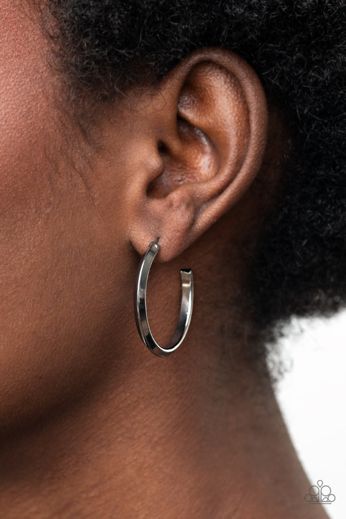 A raised spine on a shiny gunmetal hoop creates a dramatic finish to the simple design. Earring attaches to a standard post fitting. Hoop measures approximately 1" in diameter.  Sold as one pair of hoop earrings.  New Kit