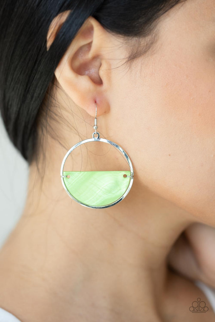 Brushed in an iridescent shimmer, a green half moon shell attaches to the bottom of a flat silver hoop for a summery splash of color. Earring attaches to a standard fishhook fitting.  Sold as one pair of earrings.  