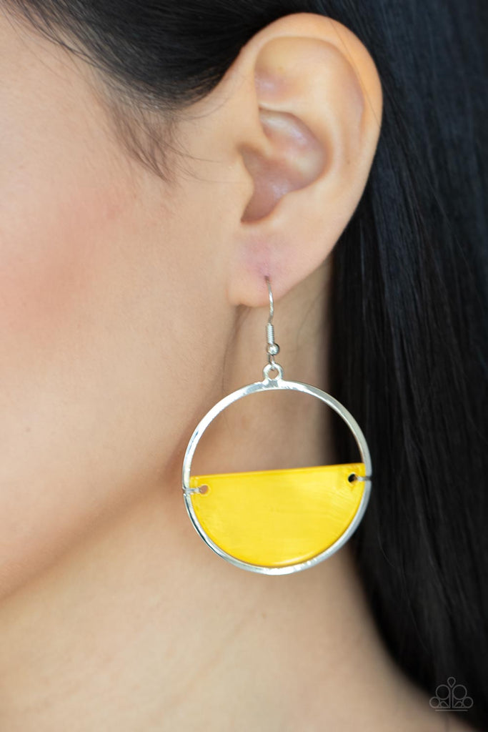 Brushed in an iridescent shimmer, an Illuminating half moon shell attaches to the bottom of a flat silver hoop for a summery splash of color. Earring attaches to a standard fishhook fitting.  Sold as one pair of earrings.