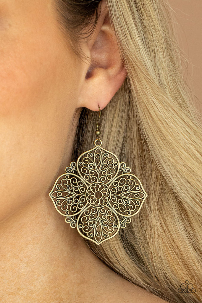 Filled with a frilly scroll, oversized antiqued brass petals bloom into a decorative floral frame for a seasonal shimmer. Earring attaches to a standard fishhook fitting.  Sold as one pair of earrings.
