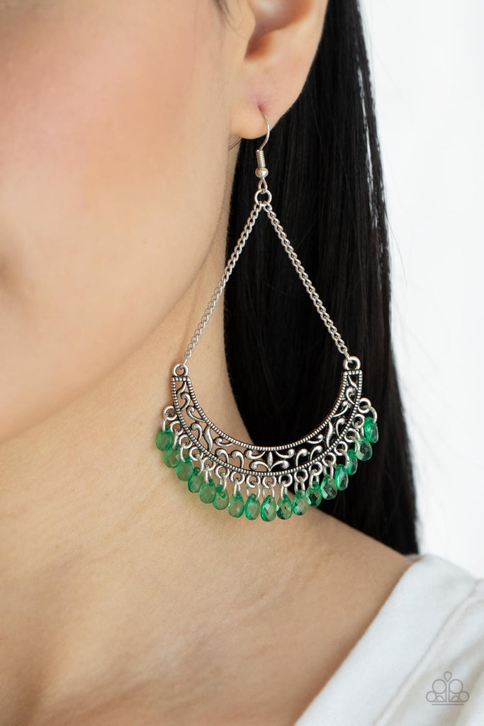 Suspended by two silver chains, a half moon silver frame filled with vine-like filigree gives way to a dainty fringe of glassy Mint teardrop beads for an enchanting fashion. Earring attaches to a standard fishhook fitting.  Sold as one pair of earrings.
