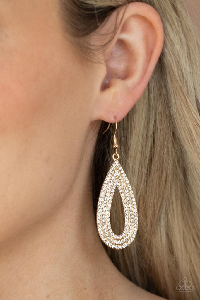 Three glittery rows of glassy white rhinestones coalesce into a sparkly golden teardrop, creating a dramatically dazzling statement piece. Earring attaches to a standard fishhook fitting.  Sold as one pair of earrings.