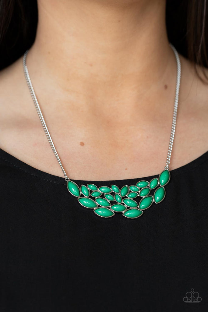 eden-escape-green Encased in sleek silver frames, a collection of marquise shaped Mint beads delicately coalesce into a leafy pendant below the collar for a whimsical pop of color. Features an adjustable clasp closure.  Sold as one individual necklace. Includes one pair of matching earrings.