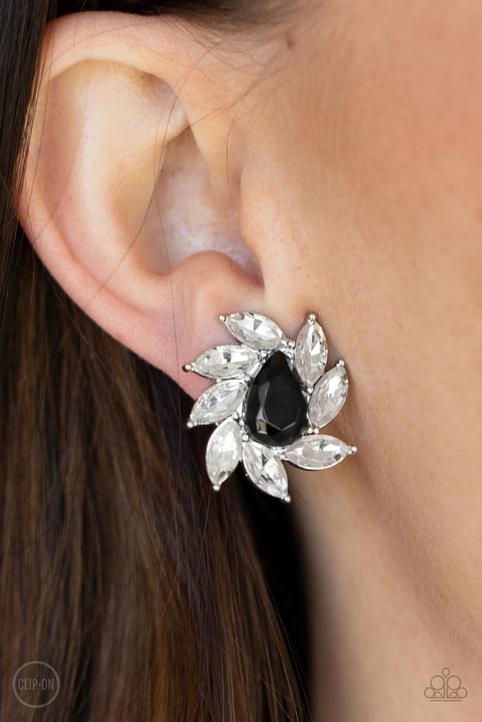 A faceted black teardrop bead is encompassed by a radiating frame of sparkling white marquise rhinestones for a dramatically vintage finish. Earring attaches to a standard clip-on fitting.  Sold as one pair of clip-on earrings.