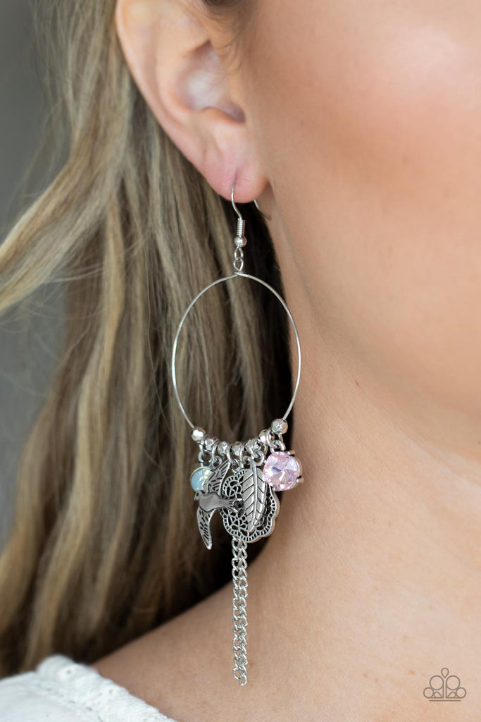 Free-spirited charms, including pink and iridescent gems, a floral medallion, a bird in flight, and a fluttering feather, dangle from a dainty silver ring coalescing into a charming lure. Earring attaches to a standard fishhook fitting.  Sold as one pair of earrings.  