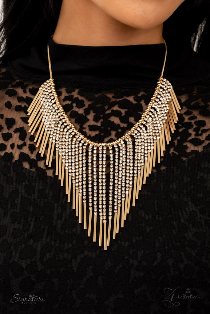 Seemingly separated by dainty gold beads, shimmery strands of white rhinestones majestically morph into gold rectangular frames along a sleekly rounded snake chain. The glamorously golden getup stacks into timelessly tapered tassels, creating a flauntable fringe below the collar. Features an adjustable clasp closure.