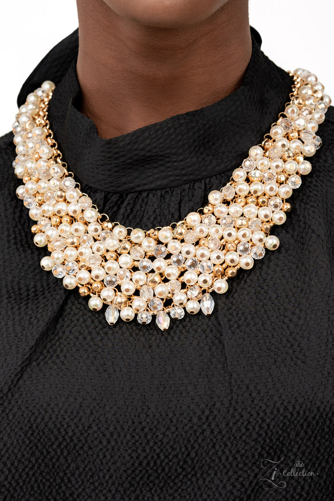sentimental Mesmerizingly mismatched crystal-like beads, white pearls, and classic white rhinestones delicately attach to a golden chain net below the collar. Jampacked with noise-making shimmer, the effervescently clustered fringe dances with each movement for an elegantly bubbly finish. Features an adjustable clasp closure.  Sold as one individual necklace. Includes one pair of matching earrings.
