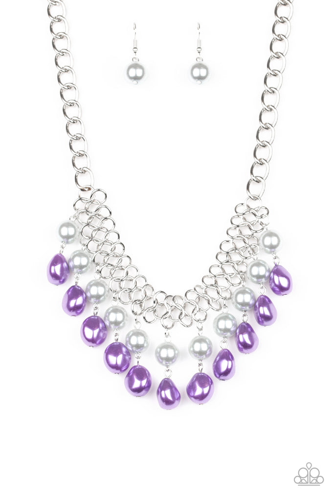 A collection of classic and imperfect silver and purple pearls dangle from a web of interlocking silver links below the collar, adding a modern twist to the timeless palette. Features an adjustable clasp closure.  Sold as one individual necklace. Includes one pair of matching earrings.