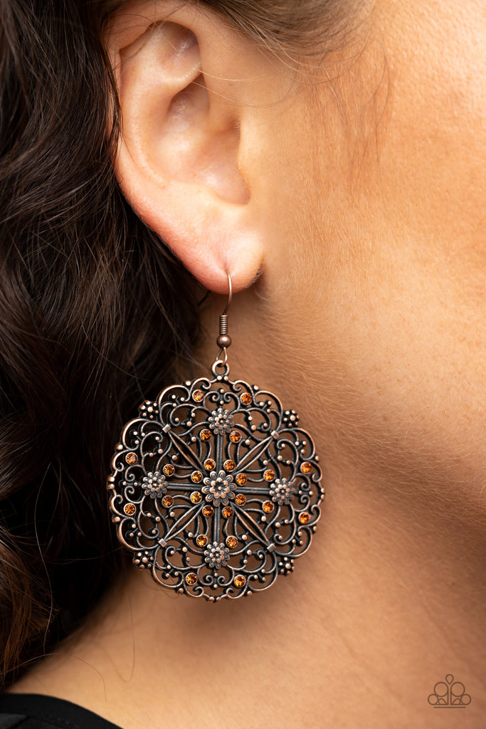 Dotted with glittery rhinestones and dainty copper flowers, antiqued filigree whirls into a whimsical frame for a colorful look. Earring attaches to a standard fishhook fitting.  Sold as one pair of earrings.