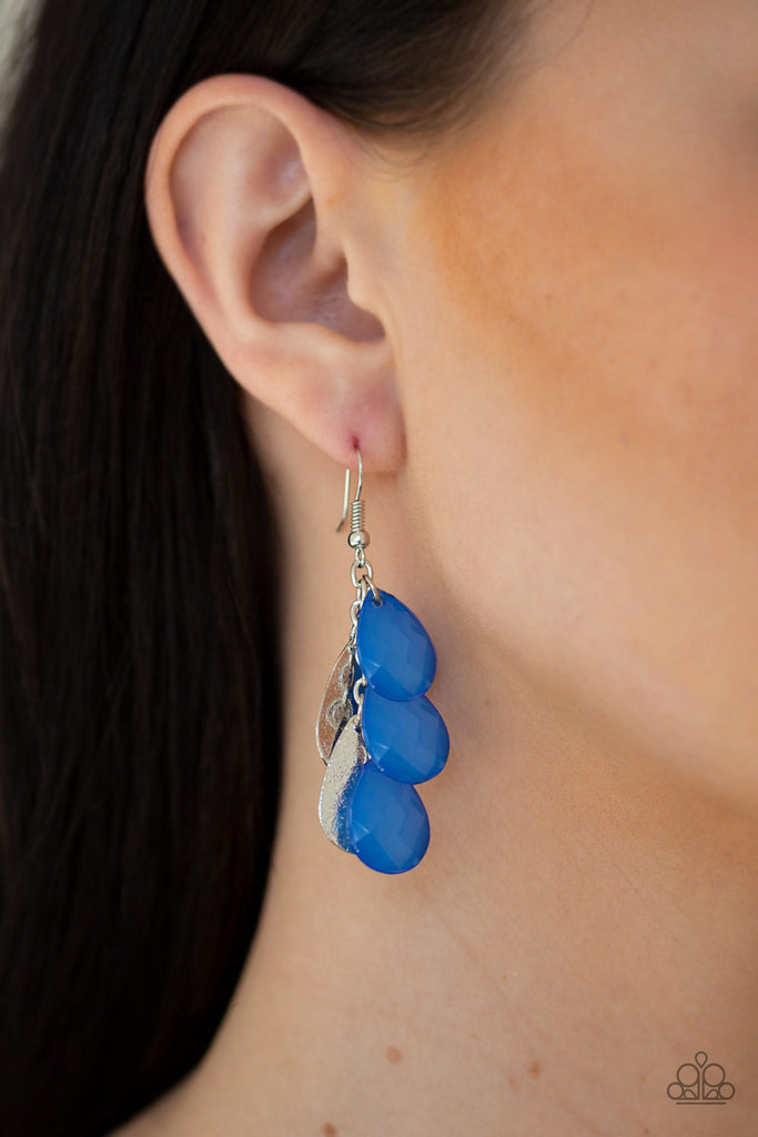 A collection of shimmery silver teardrops and faceted Princess Blue teardrops trickle from the ear, coalescing into a playful lure. Earring attaches to a standard fishhook fitting.  Sold as one pair of earrings.
