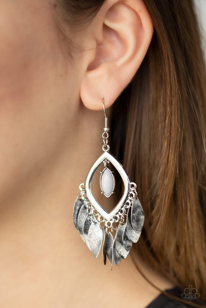 A polished gray bead swings from the top of a marquise-shaped silver frame. Delicately hammered in antiqued texture, flared silver charms cascade from the bottom of the frame, creating a noisy fringe. Earring attaches to a standard fishhook fitting.  Sold as one pair of earrings.